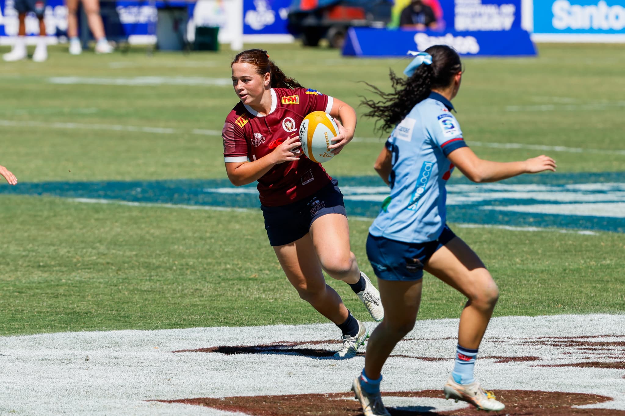 TJ Murray on the charge for the Reds women's sevens team in Roma