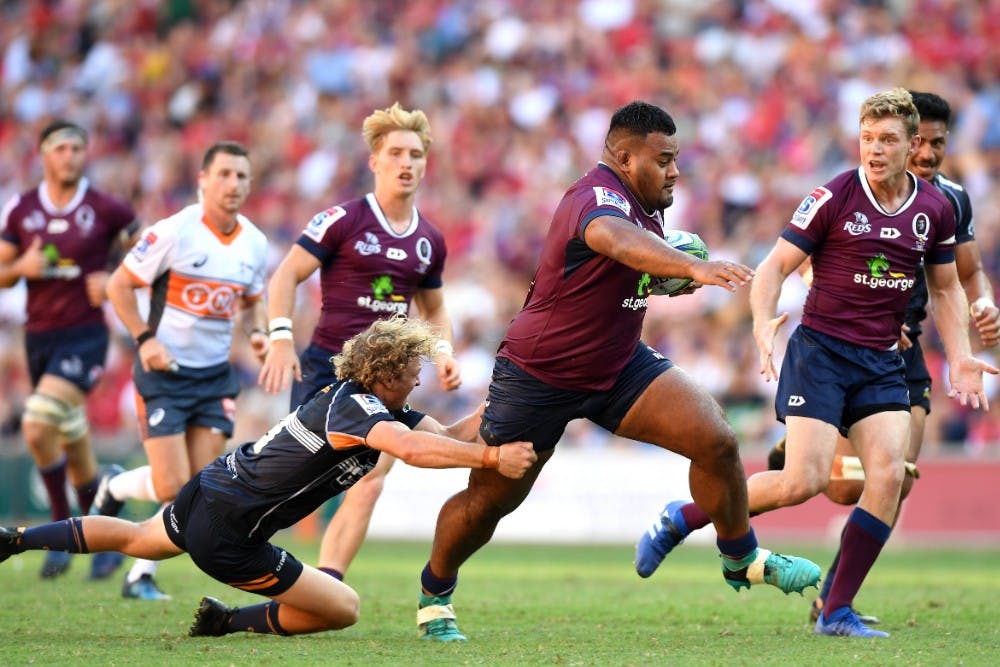Taniela Tupou on the charge for the Reds. Photo: Getty Images