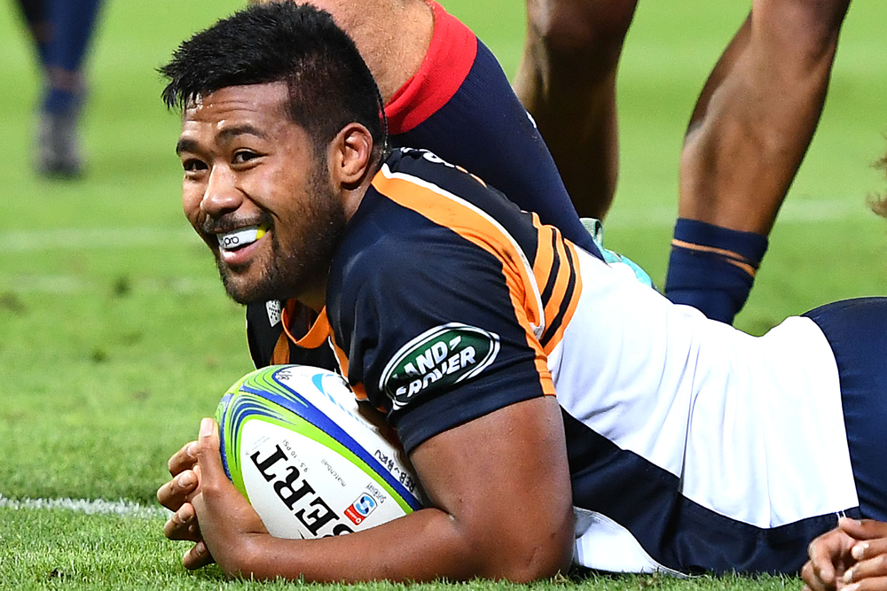 Folau Fainga'a all smiles after scoring a try for the Brumbies. Photo: Getty Images