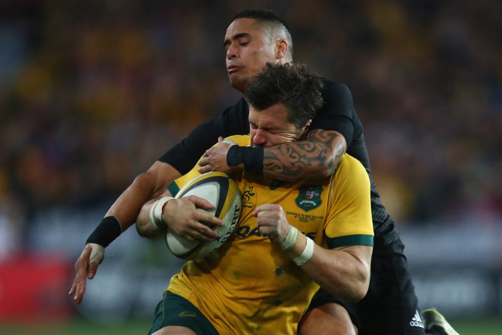 Adam Ashley-Cooper cops a high tackle in a Bledisloe. Photo Getty Images