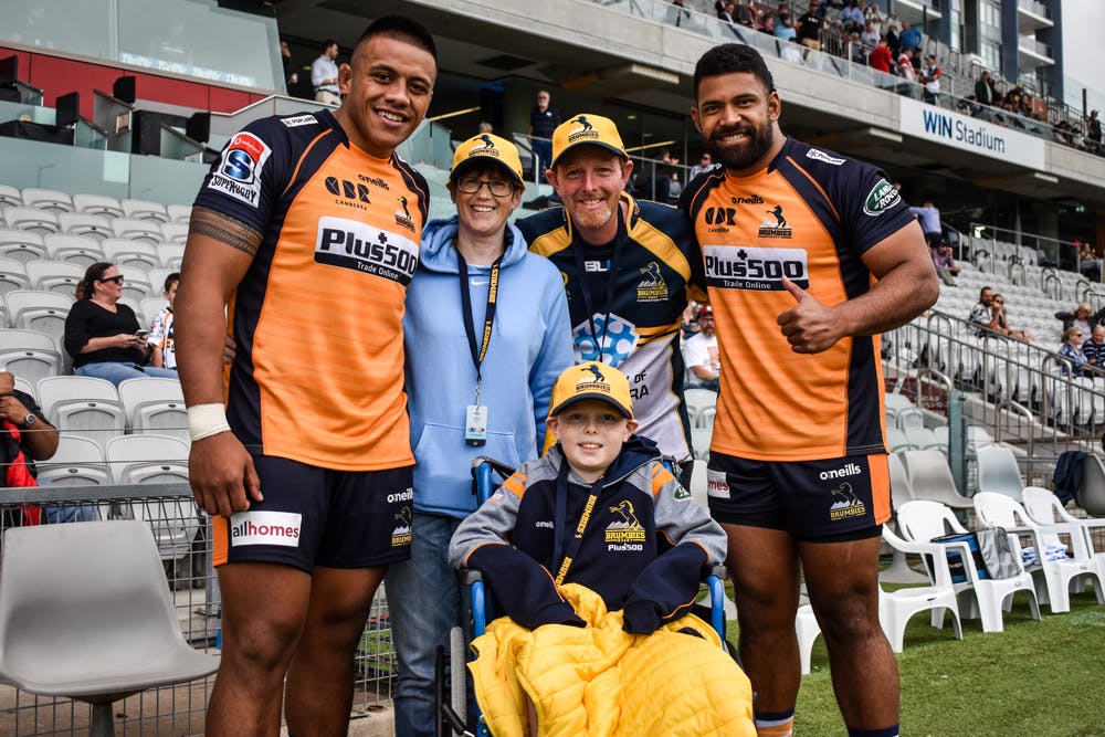 Christian Franklin and his parents with Allan Alaalatoa and Scott Sio. Photo: Lachlan Lawson/Brumbies Media