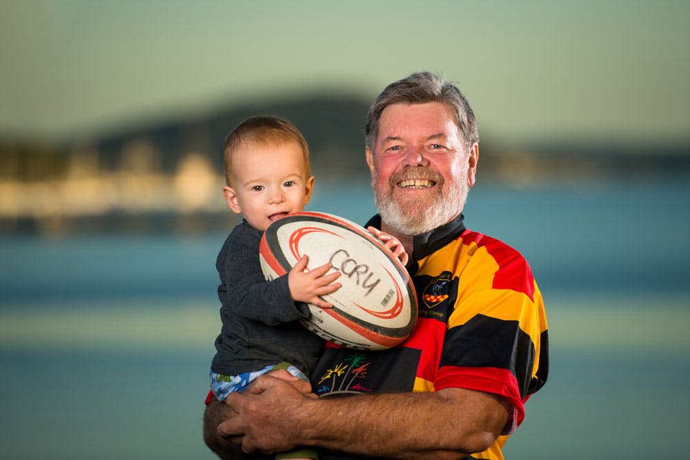 Central Coast Rugby legend Larry Thomson with grandson Archie. Photo: RUGBY.com.au/Stuart Walmsley