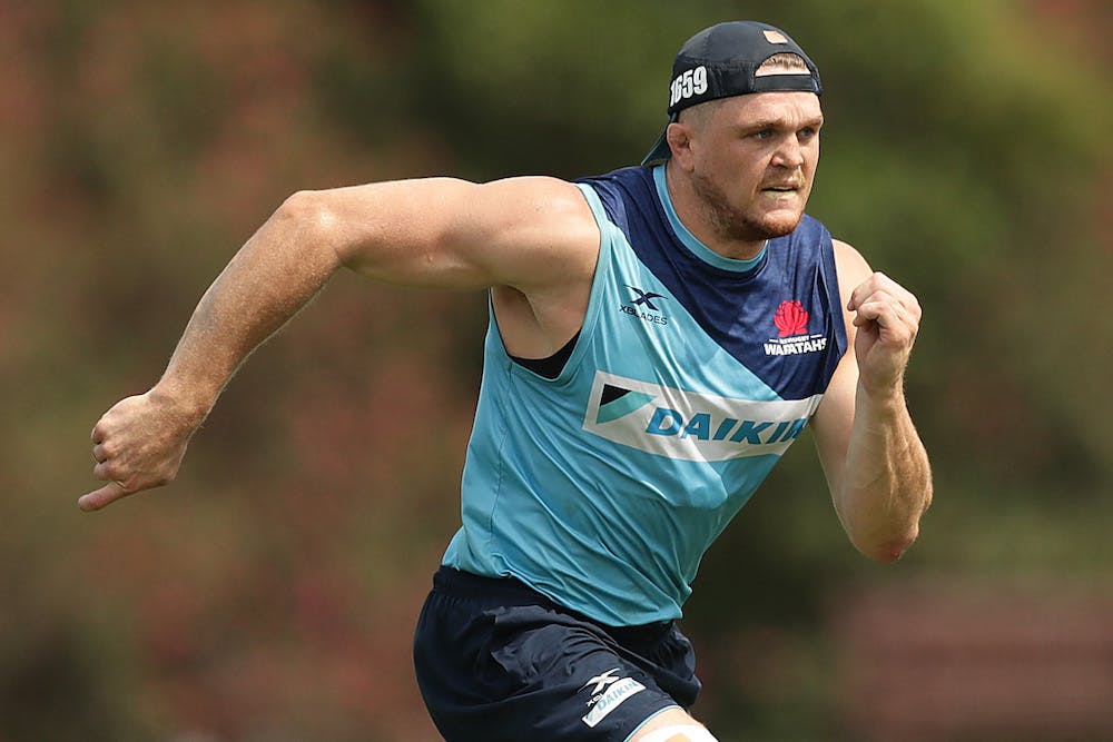 Lachie Swinton strides out at training. Photo: Getty Images