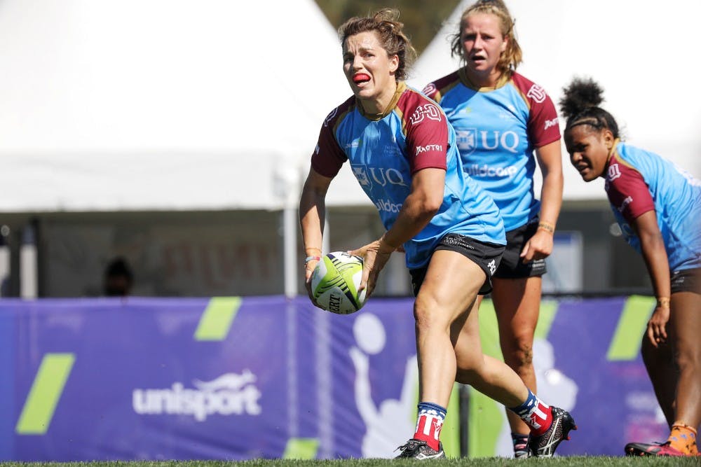 UQ captain Lori Cramer in action on day one at the Bond round of the Uni 7s. Photo: Karen Watson 