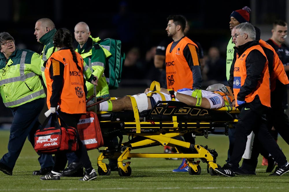Michael Fatialofa stretchered off the field after a serious injury. Photo: Getty Images