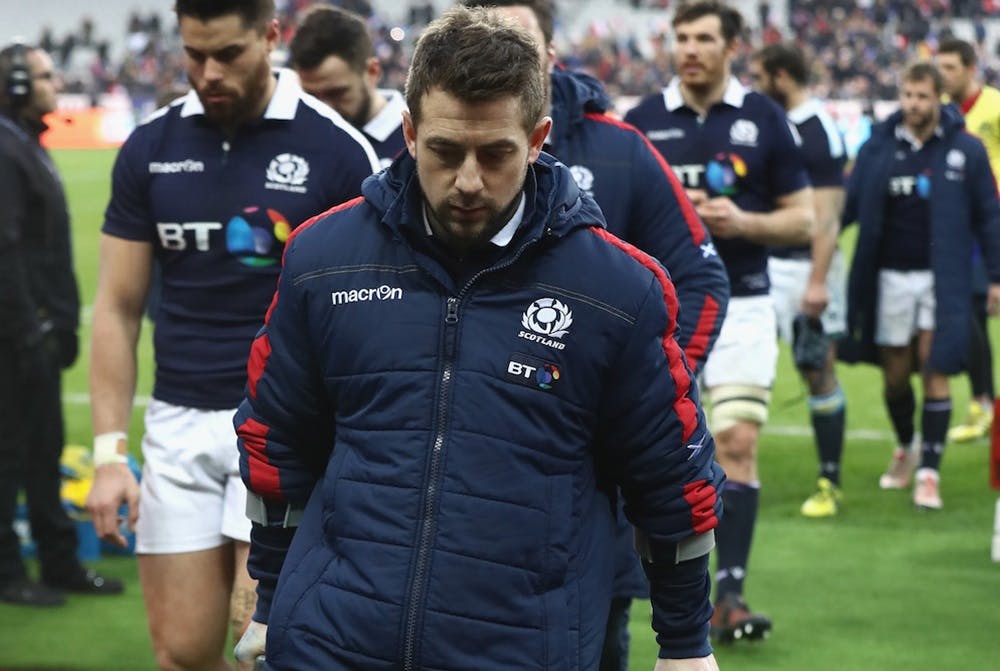 Laidlaw leaves the pitch on crutches after Scotland's defeat to France. Photo: Getty Images.
