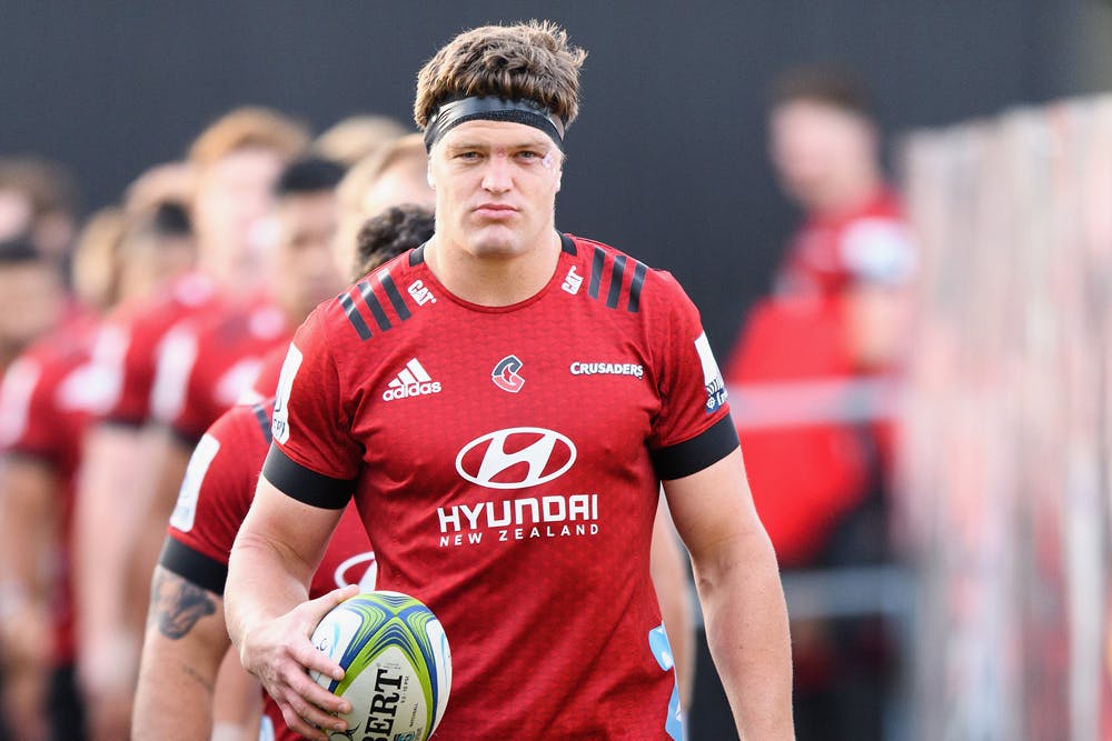 Scott Barrett leads out the Crusaders. Photo: Getty Images
