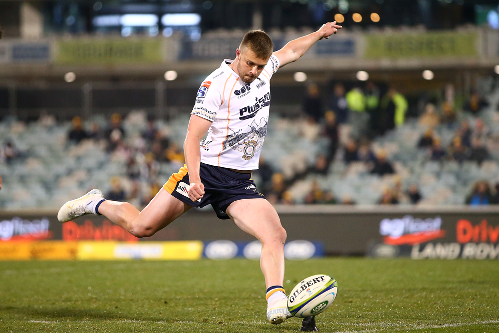 Mack Hansen boots the winning goal for the Brumbies. Photo: Getty Images