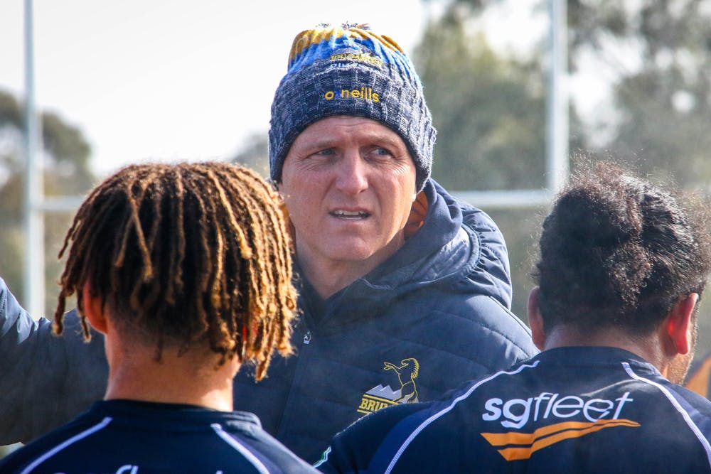 Brumbies attack coach Peter Hewat addresses players during the club's intraclub match. Photo: Rian Murphy/Brumbies Media