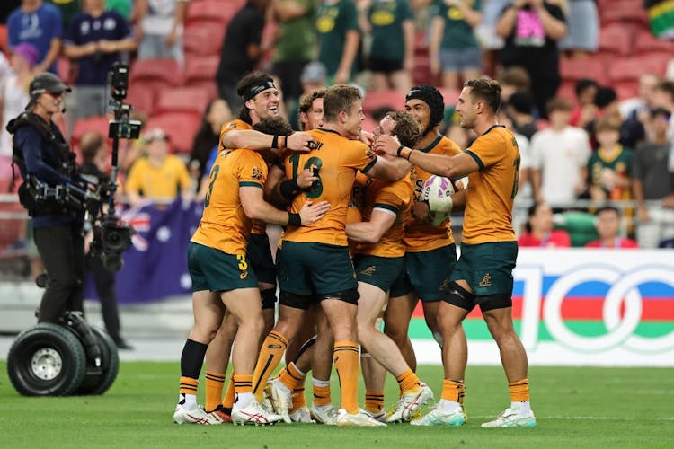 The Aussies celebrate a tough win over South Africa. Photo: World Rugby