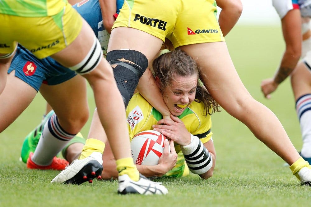 Chloe Dalton works hard in the breakdown at Clermont Sevens. Photo credit Michael Lee - KLC fotos for World Rugby