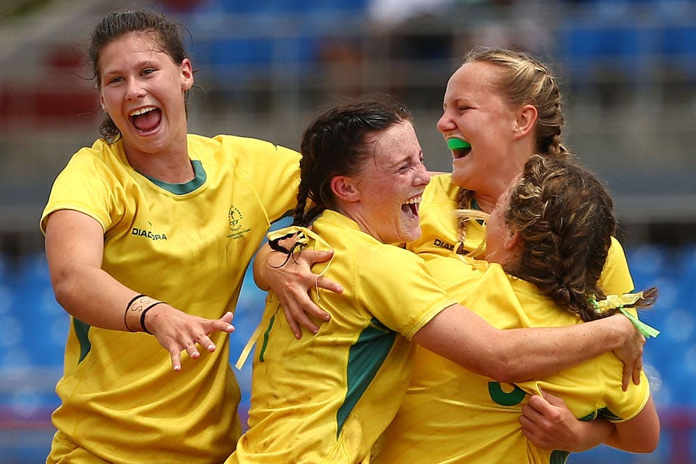 Jerseys on the line. Women celebrate winning gold at the Commonwealth Youth Games in 2015. Photo: Getty Images