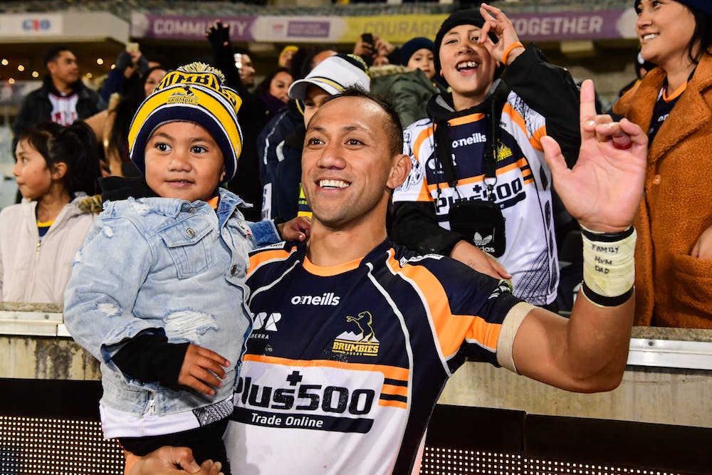 Christian Lealiifano and his son after being farewell by the Brumbies faithful. Photo: Stu Walmsley/RUGBY.com.au