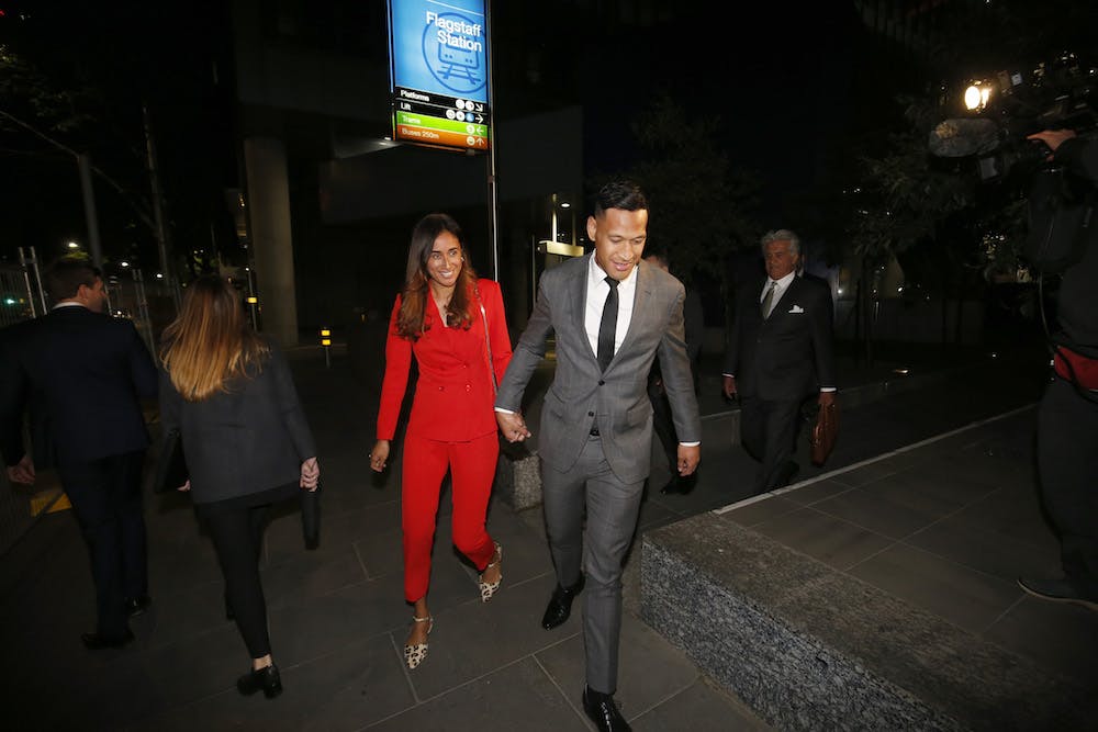 Israel Folau leaves the mediation hearing in Melbourne with wife Maria. Photo: Getty Images 
