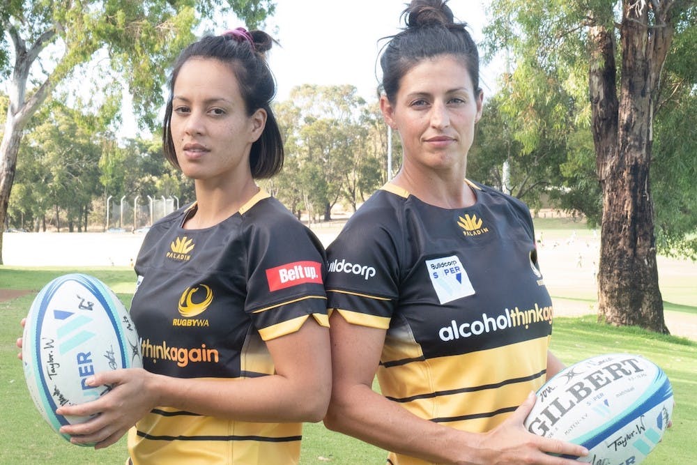 Super W players Mhicca Carter and Natasha Haines modelling the gold and black jersey of RugbyWA women. Photo: RugbyWA