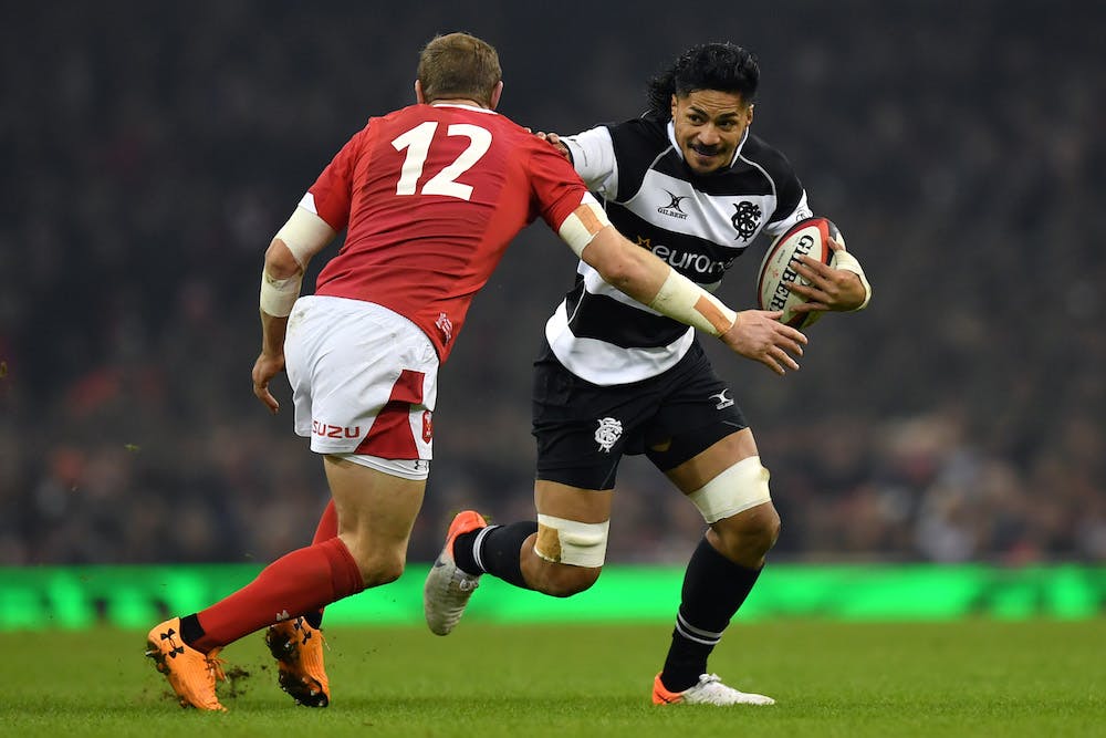 Pete Samu takes on Hadleigh Parkes in Principality Stadium. Photo: Getty Images 