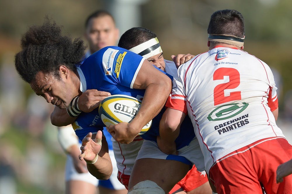Royals centre Soakai Tai charges in the 2013 John I Dent Grand Final. Photo: Getty Images 