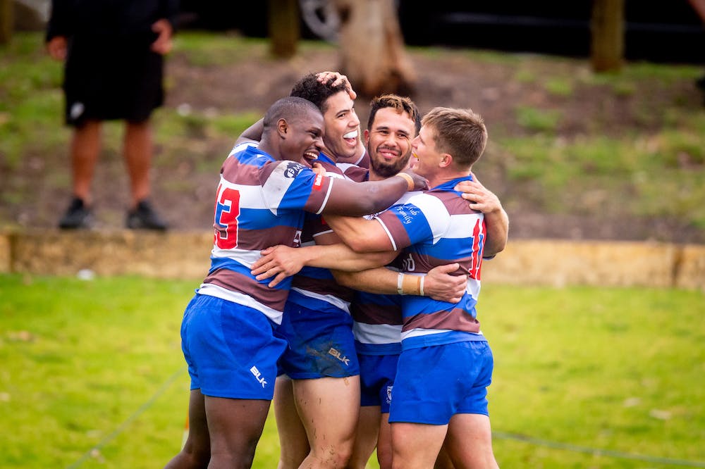Palmyra celebrating a try in the Fortescue Premier Grade.
