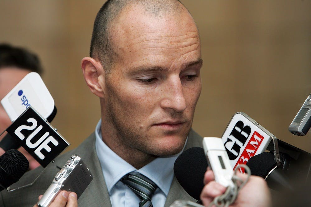 Wallabies captain Stirling Mortlock faces media after arriving home following a quarter-final exit in 2007. Photo: Getty Images