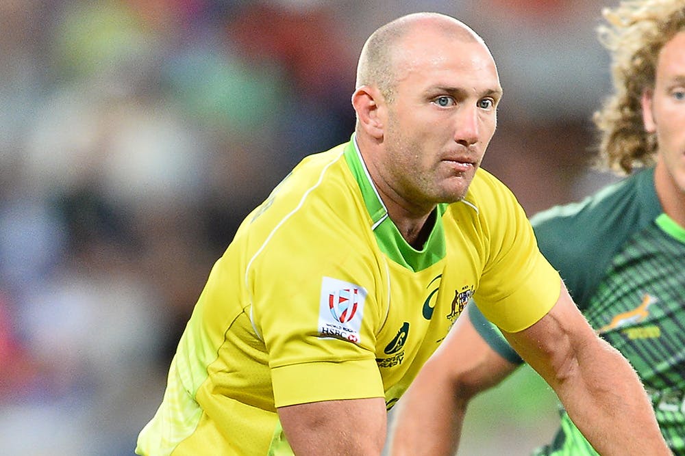 James Stannard battled on gamely for the Aussie men's Sevens team despite losing a tooth. Photo: Getty Images
