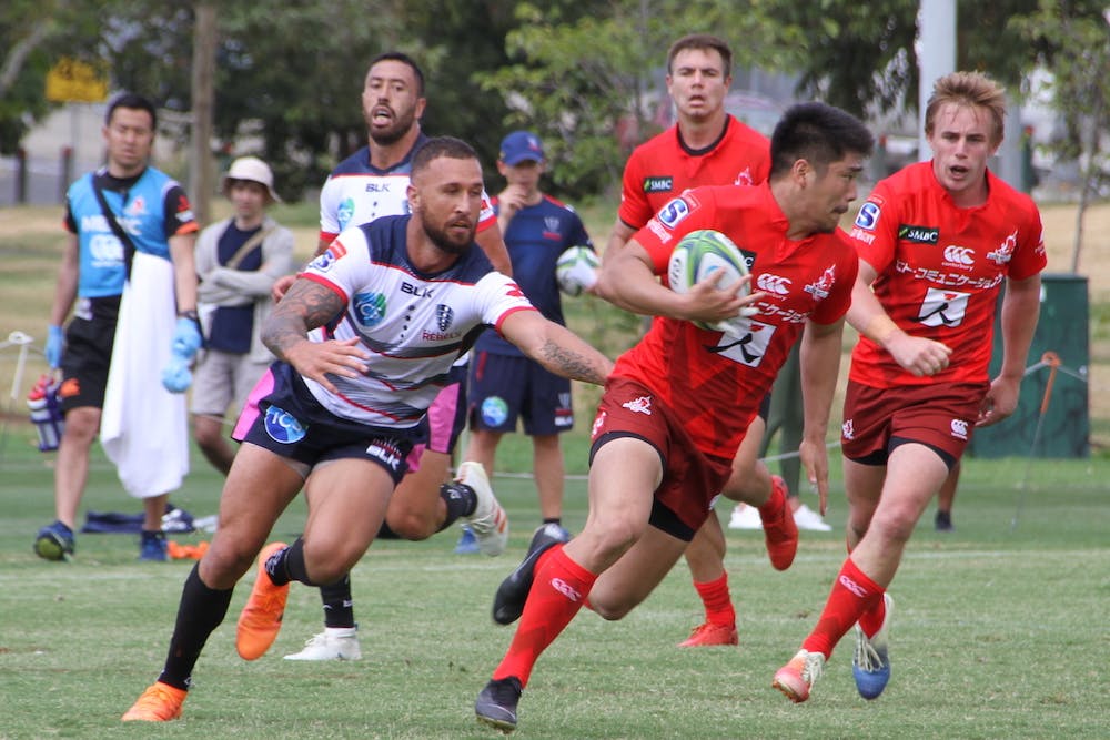Quade Cooper reaches out for a tackle in the Rebels-Sunwolves hit-out. Photo: Rebels media