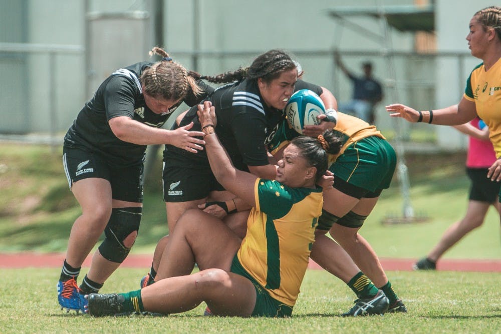 Australia A front-rower Christina Sekona attempts to bring down New Zealand's Angel Mulu. Photo: Getty Images