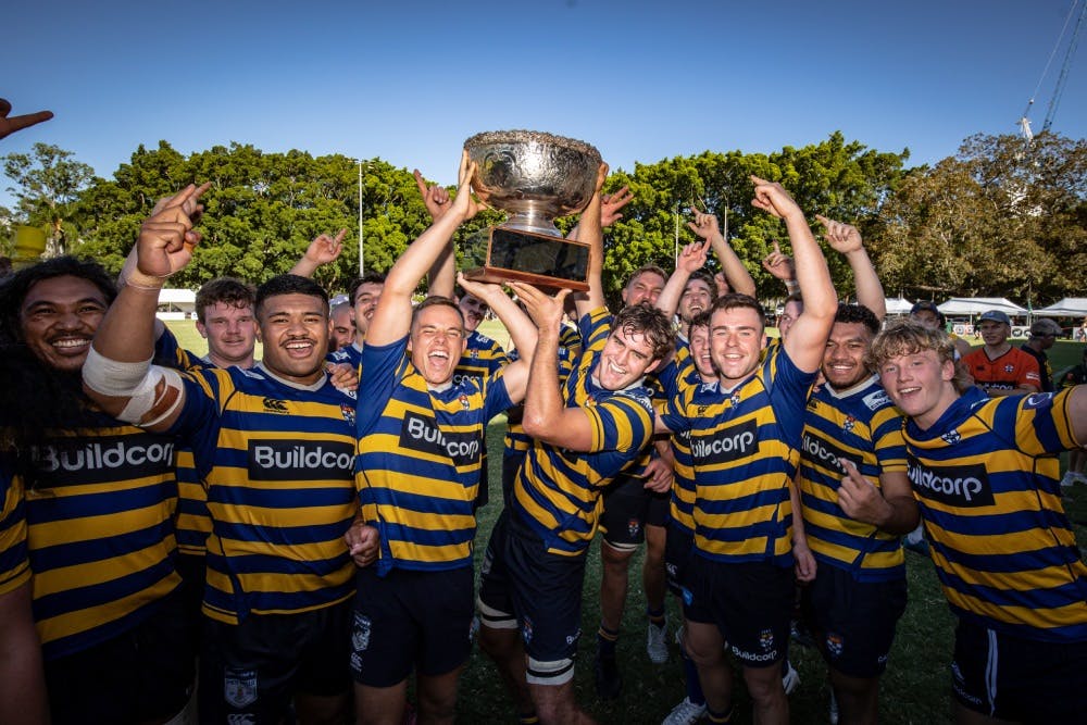 Sydney University celebrate with the Bernie Power Cup after their Australian Club Championship win over Wests. Photo: Brendan Hertel, QRU