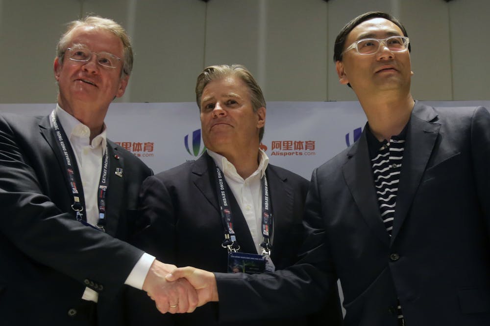 Former Wolrd Rugby Chairman Bernard Lapasset (L), chairman of World Rugby, Brett Gosper (C), CEO of World Rugby and Dazhong Zhang of Alisports (R) pose for a photo at a press conference after signing a partnership to see development of rugby in China in April 10, 2016. Photo: AFP